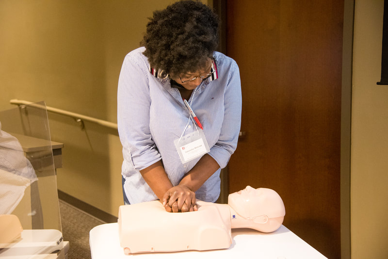 MiMP trainee performing CPR on training mannequin 